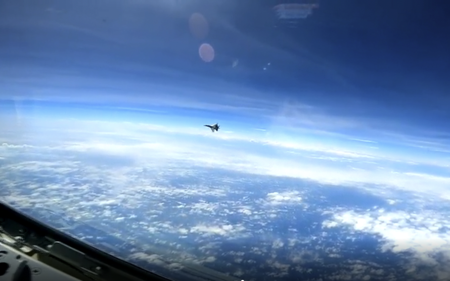 A screen shot of a midair military encounter between China and the United States.