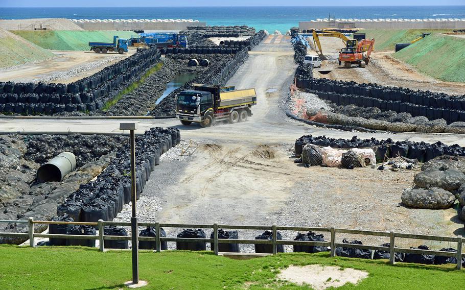 Construction work continues on a Marine Corps runway into Oura Bay at Camp Schwab, Okinawa, Sept. 15, 2022.