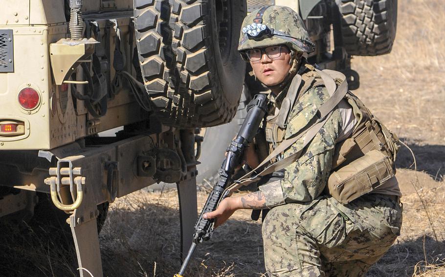 Petty Officer 3rd Class Wenheng Zhao during a field training exercise at Fort Hunter Liggett, Calif., in 2019. Zhao, who had since risen in rank to petty officer 2nd class, was sentenced to more than two years in prison and kicked out of the Navy for passing sensitive information about the U.S. military to China. 