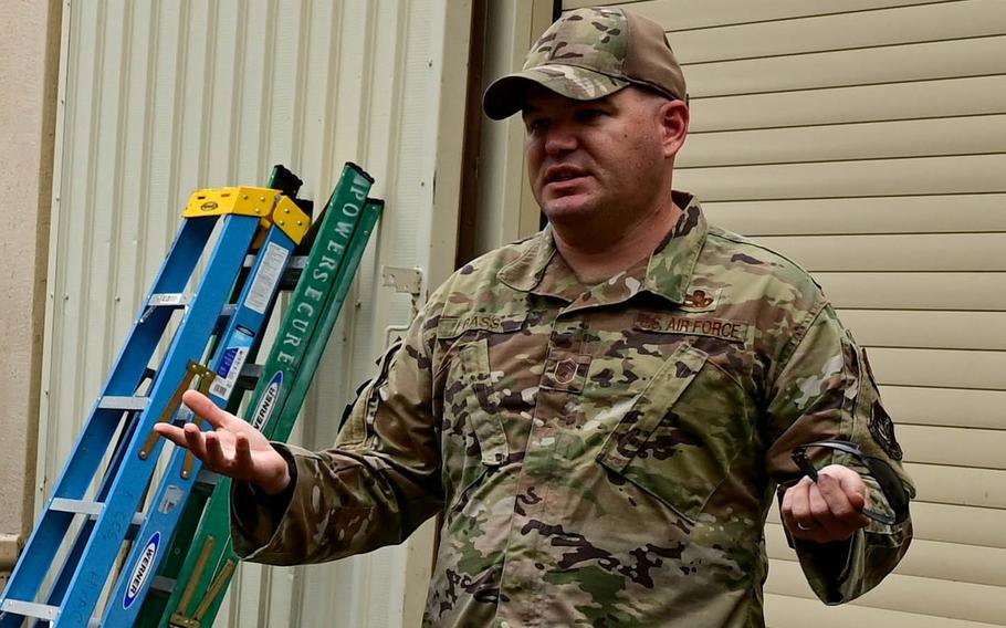 Master Sgt. Charles Bass, then assigned as first sergeant with the 8th Civil Engineer Squadron, speaks with augmentees before they start work at Kunsan Air Base, South Korea, Sept. 12, 2022. 