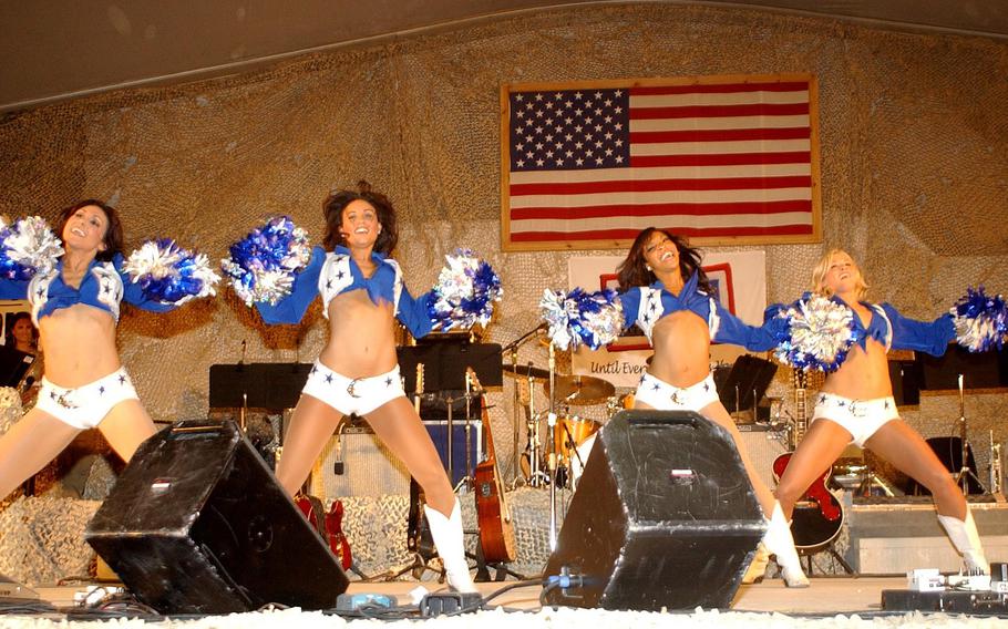 Dallas Cowboys cheerleaders dance for service members during the sergeant major of the Army's 2007 "Hope and Freedom" tour Dec. 23 at Bagram Airfield. Over the years, many performers visited the troops at Bagram, mostly with USO tours.