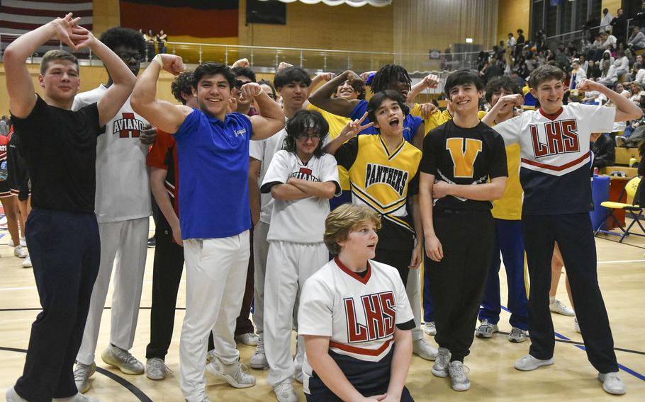 Male cheerleaders from across DODEA-Europe share a lighthearted moment at the conclusion of the 2024 DODEA-Europe Cheerleading Championships in Wiesbaden, Germany on Friday, Feb. 16, 2024. 