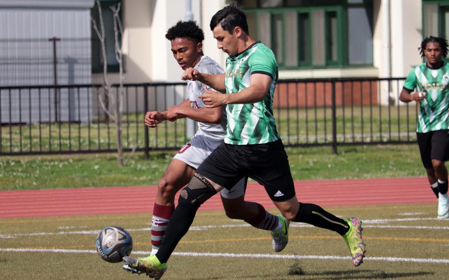 Jalen Cooley and Elijah Carrillo battle for the ball.