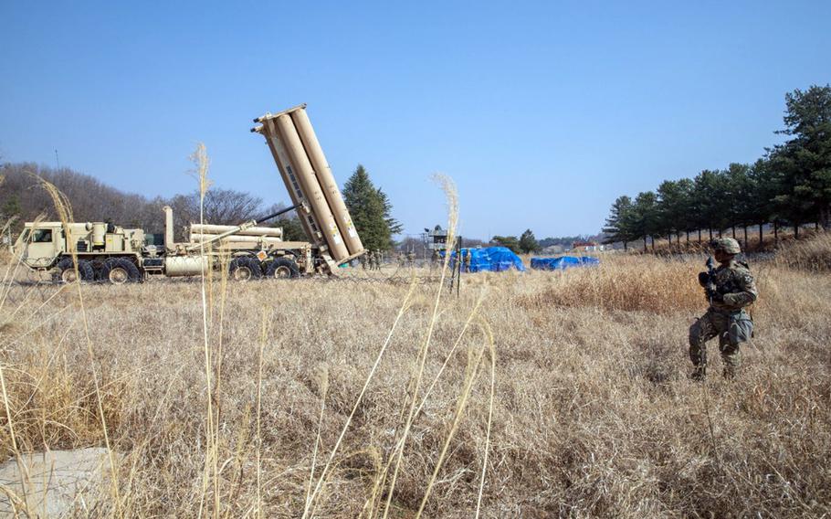 Spc. Najuusah Mulbah of the 2nd Stryker Brigade Combat Team patrols the perimeter of a Terminal High Altitude Area Defense, or THAAD, missile-defense system in South Korea, March 19, 2023. 