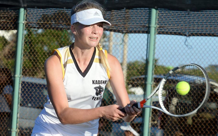 Kadena's Brooke Brewer hits a backhand return.
