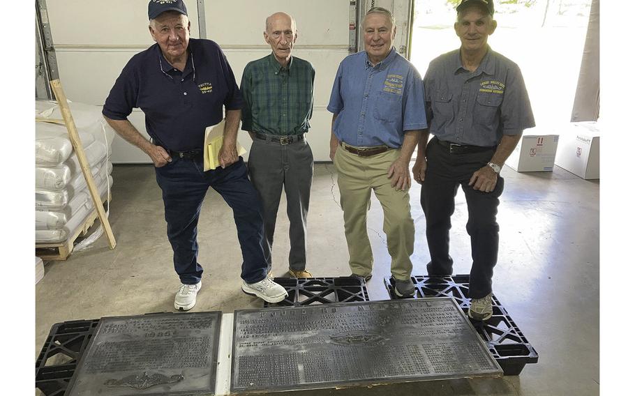 Submarine veterans, from left, James Dal Maso of Emmaus, Bill Reightler of Catasauqua, Tom Sabol of Catasauqua and George Dolgos of Allentown. They are standing with plaques that used to be part of a memorial honoring submarine veterans from World War II.