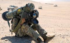 Pfc. Woodrow Head, an infantryman with Company B, 1st Battalion, 155th Infantry Regiment, Mississippi Army National Guard, prepares to fire a Javelin shoulder-fired anti-tank missile at opposing forces during a combat exercise at the National Training Center, Fort Irwin, California, June 12, 2021. 