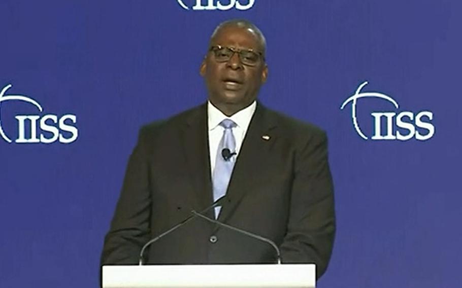 U.S. Secretary of Defense Lloyd Austin speaks at the Shangri-La Dialogue, a defense summit in Singapore, on June 11, 2022, in this screenshot of a livestream video.
