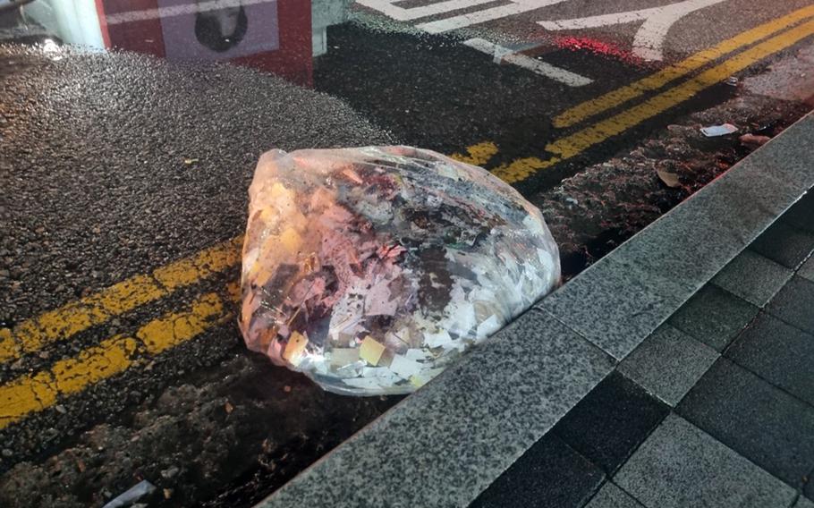 A bag of trash carried by a North Korean balloon is pictured in Seoul, South Korea, June, 1, 2024.