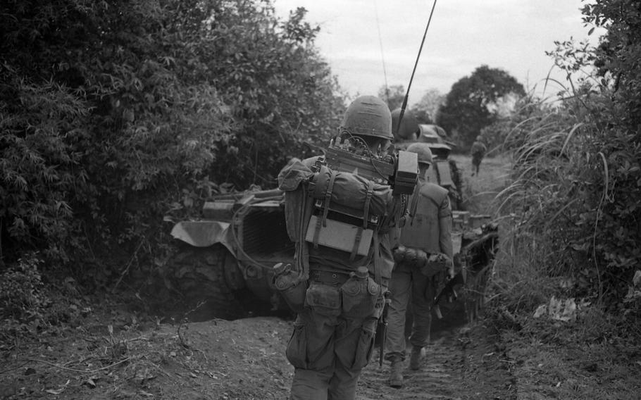 Alpha Company, 1st Battalion, 9th Marines move out on a platoon-sized  sweep supported by tanks on May 16, 1967, just one-and-a-half miles outside of Con Thien.