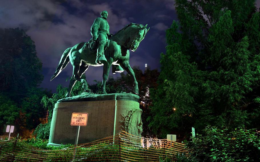 This photo from 2018 shows a statue of Confederate Gen. Robert E. Lee in Charlottesville, Va., not far from where John Henry James was lynched by a mob in 1898. The statue was removed in July. MUST CREDIT: Washington Post photo by Michael S. Williamson.