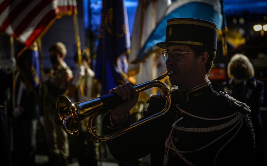 A ceremonial bugle call signals the end of the official ceremonies during a wreath laying at the Arc de Triomphe in Paris, Oct. 26, 2021. 