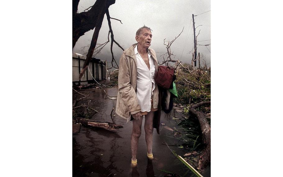 Harold “Tex” Keith stands outside his trailer park home at ground zero on Aug. 24, 1992, in Florida City after after Hurricane Andrew left the area.