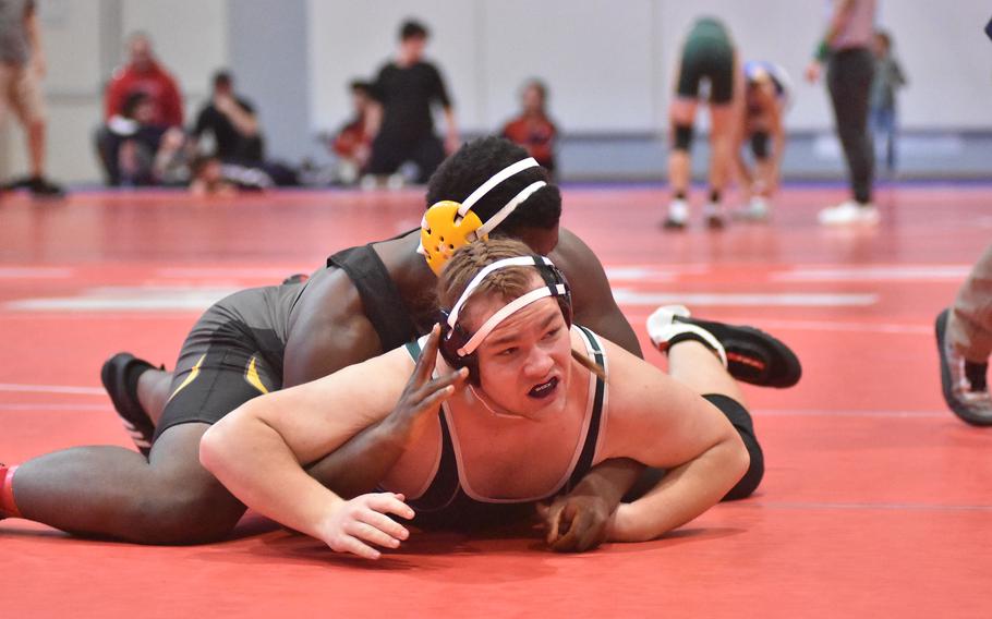 Vicenza's Daniel Bagoudou keeps Naples' Declan Newsome to the mat at 285 pounds Saturday, Jan. 14, 2023 at Aviano, Italy. Bagoudou went on to win by pin.

Kent Harris/Stars and Stripes