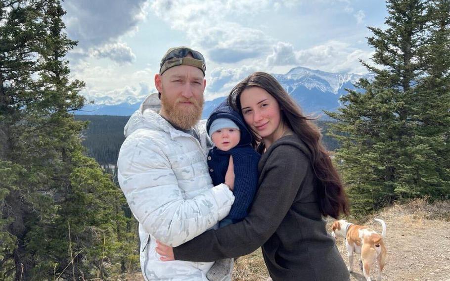 Jacob Flickinger, an aid worker with World Central Kitchen, pictured with his partner, Sandy Leclerc, and their son. 