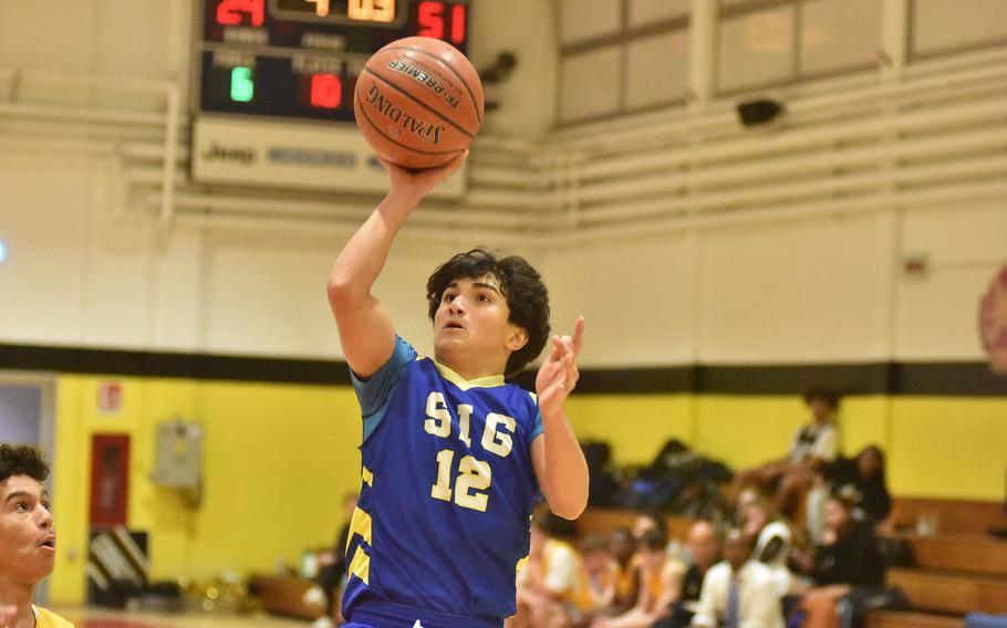 Sigonella's Alessandro Montero puts up a floater Friday, Jan. 6, 2023, in the Jaguars' 55-28 victory over Vicenza.