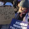 FILE - Demonstrators rally in support of federal workers outside of the Department of Health and Human Services, Feb. 14, 2025, in Washington. (AP Photo/Mark Schiefelbein, File)