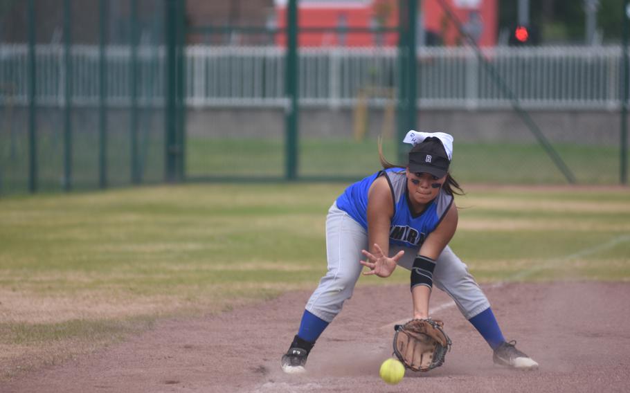 Rota third baseman Esperanza Rodriguez fields the ball during a first-round game against Hohenfels in the DODEA-Europe softball tournament on Thursday, May 19, 2022, at Kaiserslautern High School, Germany. Rota went on to win, 17-10.