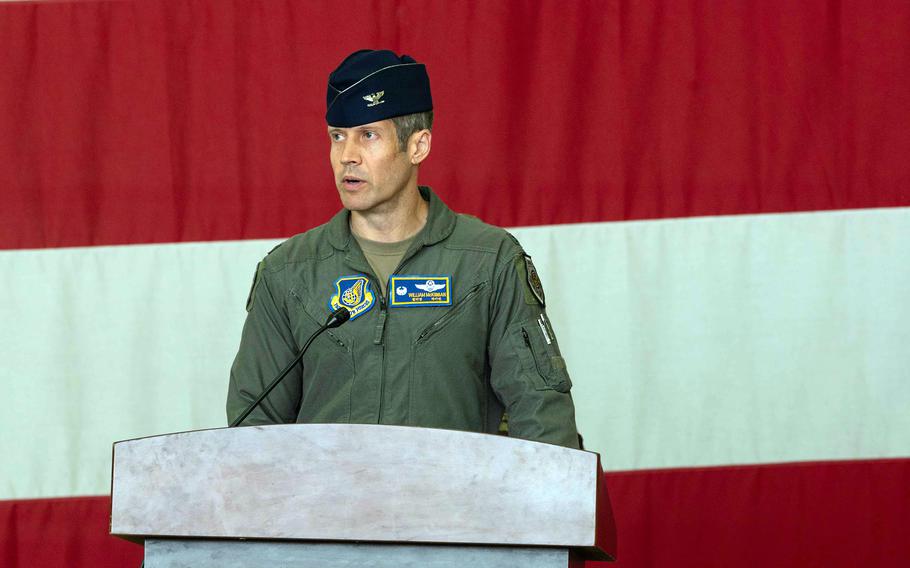 The 51st Fighter Wing's new commander, Col. William McKibban, gives his first speech to his wing during a change-of-command ceremony at Osan Air Base, South Korea, Tuesday, June 20, 2023.