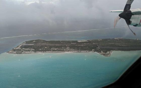 A Coast Guard HC-130 Hercules aircrew from Air Station Barbers Point successfully evacuated four Fish and Wildlife personnel off Johnston Atoll, Oct. 1, 2018. While Hurricane Walaka is far removed from large population centers it has become necessary to evacuate U.S. Fish and Wildlife personnel. (U.S. Coast Guard photo by Petty Officer 3rd Class Michael Griffin/Released)