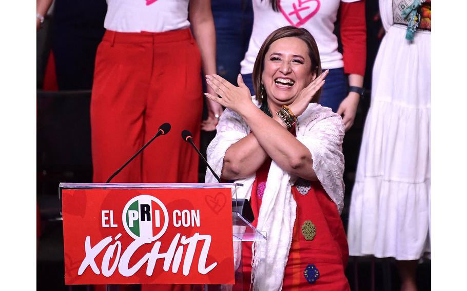 Mexican Senator and presidential candidate for the Frente Amplio por Mexico, Xochitl Galvez, greets supporters during a rally of the Institutional Revolutionary Party in Mexico City on Sept. 8, 2023. 