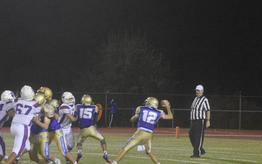 Wiesbaden quarterback Logan Hall attempts a pass against the Ramstein Royals during a game in Wiesbaden on Friday, Sept. 17, 2021.