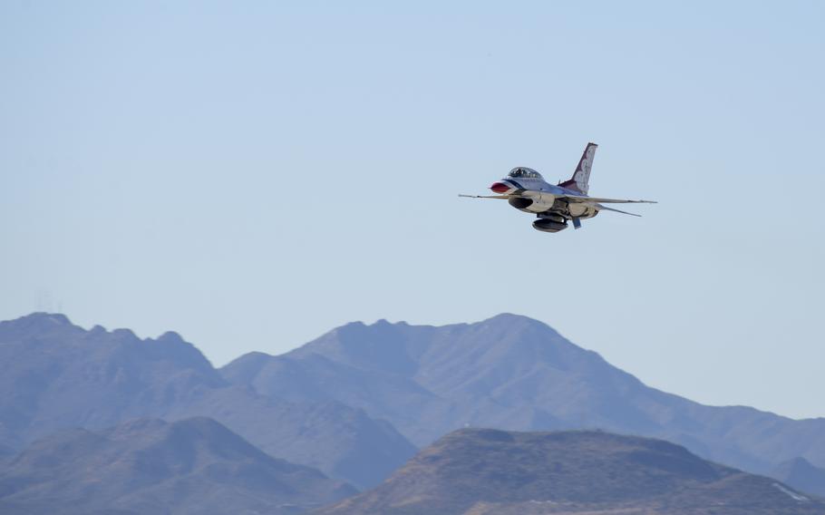 U.S. Air Force Maj. Kevin Walsh, U.S. Air Force Air Demonstration Squadron pilot and operations officer, launches Thunderbird 7, an F-16 Fighting Falcon, with Brendon Lyons, Tucson community hometown hero, in the rear seat at Davis-Monthan Air Force Base, Ariz., March 11, 2016.  Lyons was nominated as a hometown hero because of his commitment to safety and his passion to make Tucson a safer community for cyclists and motorists. 