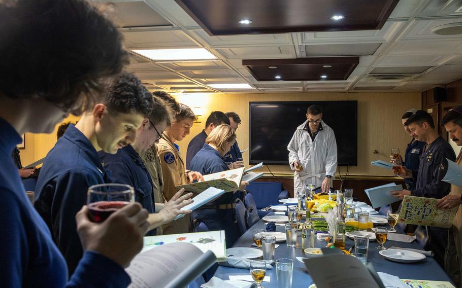 Sailors participate in a Passover Seder