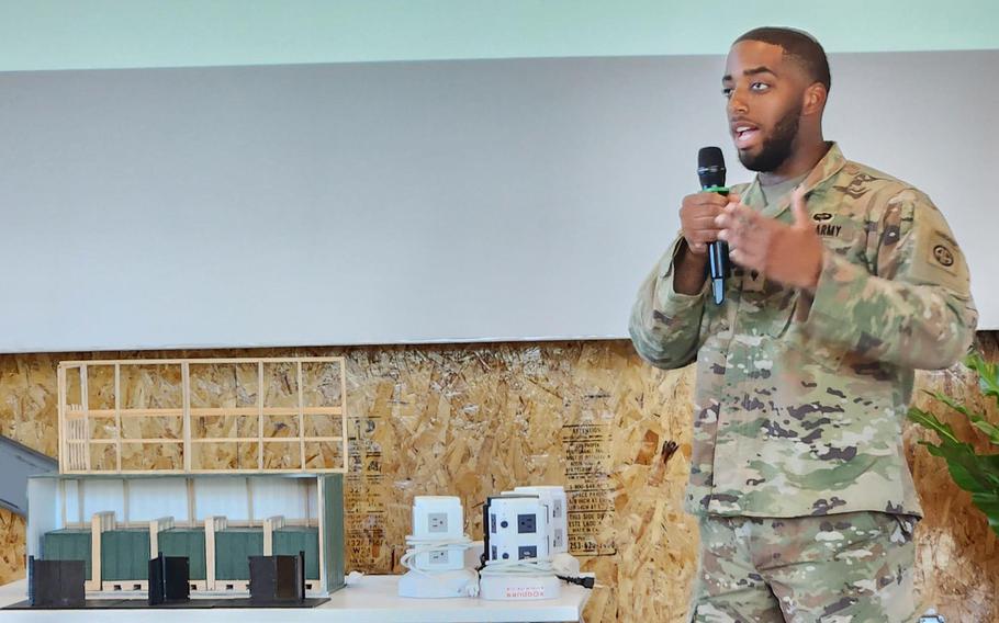 Spc. Akin Atkins, of the 82nd Airborne Division, pitches his team’s idea for more efficiently filling shipping containers during the Dragon’s Lair Innovation Competition in Honolulu on Nov. 2.