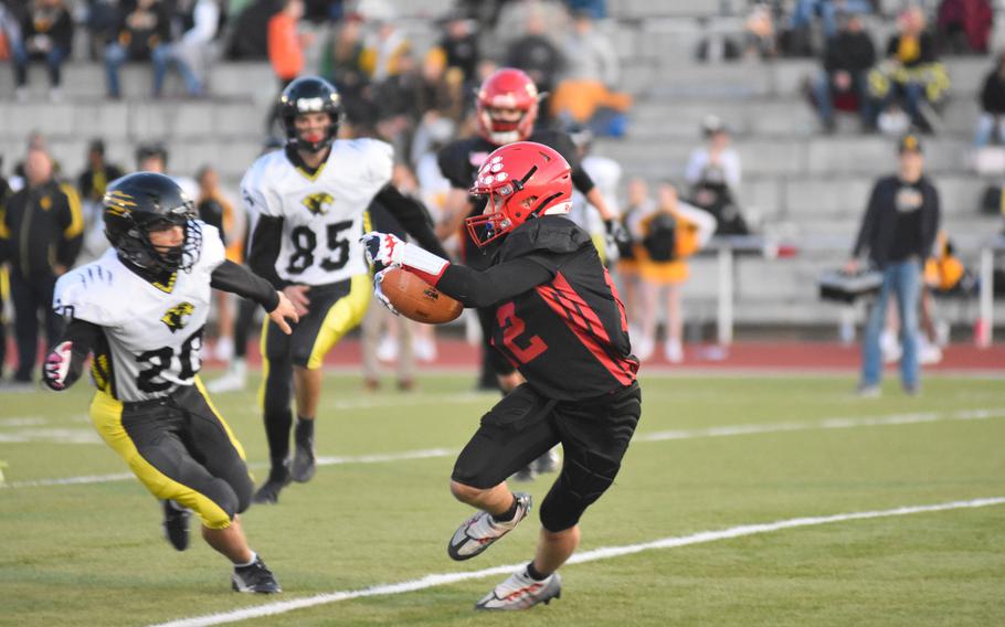 Kaiserslautern’s Aaron Potter carries the ball early on in a Friday night game against Stuttgart on Sept. 30, 2022, at Kaiserslautern, Germany. 