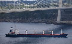 The Sierra Leone-flagged cargo ship Razoni sails under Yavuz Sultan Selim Bridge after being inspected by Russian, Ukrainian, Turkish and U.N. officials at the entrance of the Bosphorus Strait in Istanbul, Turkey, Wednesday, Aug. 3, 2022. Razoni, loaded up with 26,000 tons of corn, is the first cargo ship to leave Ukraine since the Russian invasion, and set sail from Odesa on Monday, August 1, 2022. Its final destination is Lebanon. (AP Photo/Emrah Gurel)