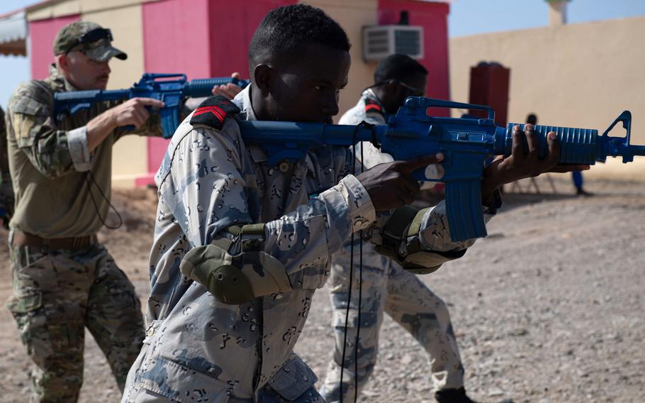 U.S. Coast Guard Petty Officer 1st Class Andrew Knowles, left, and members of the Djiboutian coast guard train in Djibouti in October 2019. Cutlass Express 2021, a two-week exercise sponsored by U.S. Africa Command and led by U.S. Naval Forces Europe-Africa/U.S. 6th Fleet, kicked off in Djibouti on July 25, 2021.