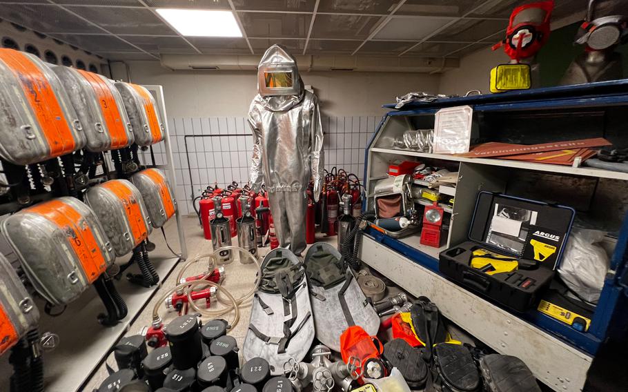 Indoor firefighter equipment on display in the the former German government bunker complex in Bad Neuenahr-Ahrweiler, Germany, Feb. 13, 2022. During a nuclear attack scenario, the subterranean complex would have been hermetically sealed.