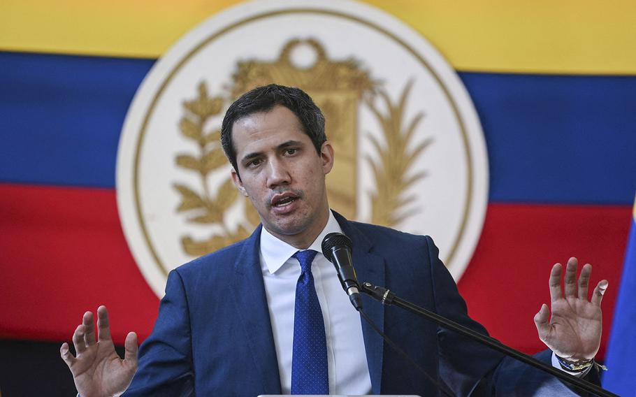 Juan Guaido gestures while speaking during a press conference at the Morichal Park, the day after regional and municipal elections in Caracas, on Nov. 22, 2021. 