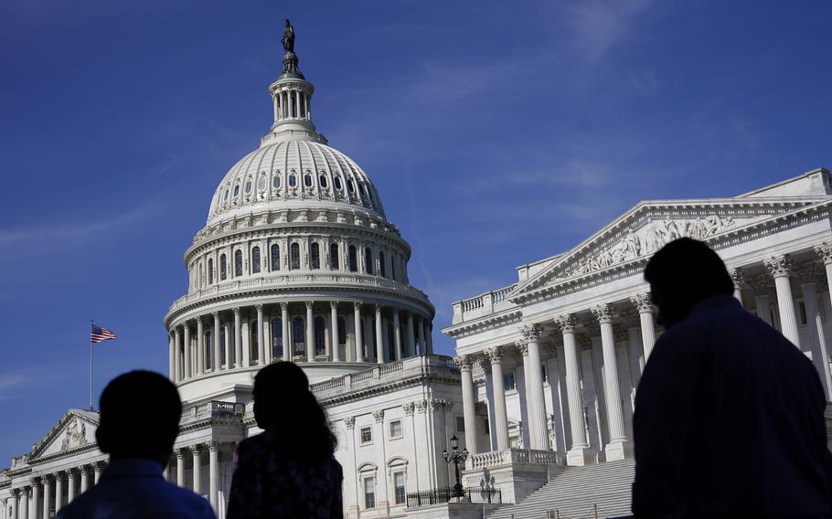 People walk outside the U.S. Capitol building in Washington on June 9, 2022. Members of the House and Senate were informed Wednesday, March 8, 2023, that hackers may have gained access to their sensitive personal data in a breach of a Washington, D.C., health insurance marketplace.