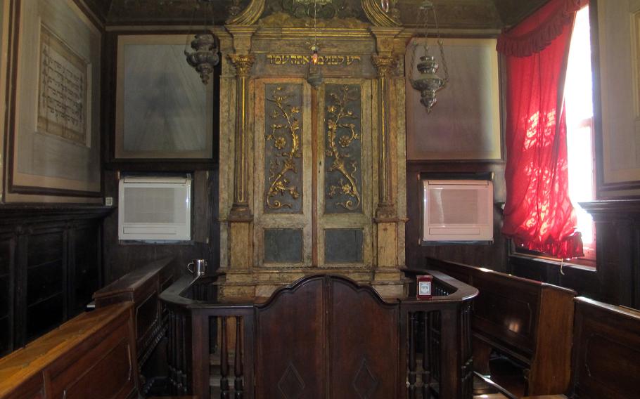 The ornate cabinet or ark inside the Levantine synagogue in Venice's Jewish ghetto is used to enshrine the sacred Torah scrolls used for worship.