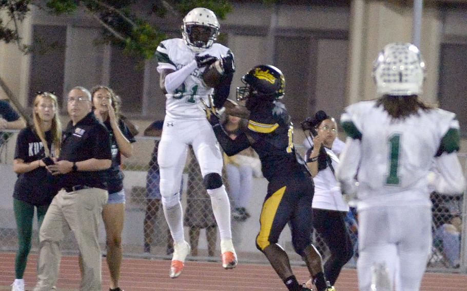 Kubasaki's Malachi Pinkston hauls in a pass during the Far East Division I final.