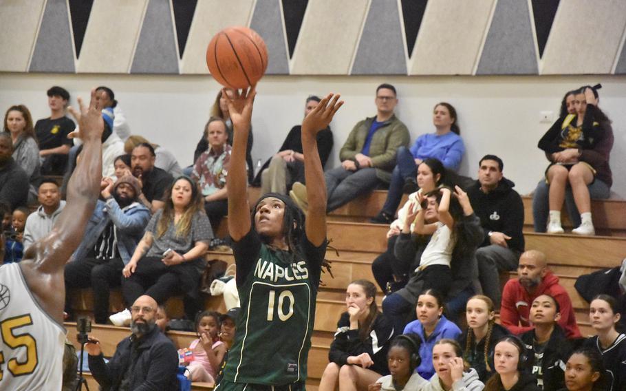 Jeramiah Robinson shoots from long distance.