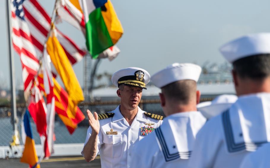 Capt. Matthew Thomas, center, commanding officer aboard the San Antonio-class amphibious transport dock ship USS Portland (LPD 27), addresses the crew during a special morning colors observance for Memorial Day at Los Angeles Fleet Week, May 30, 2022. LAFW is an opportunity for the American public to meet their Navy, Marine Corps and Coast Guard teams and experience America’s sea services.