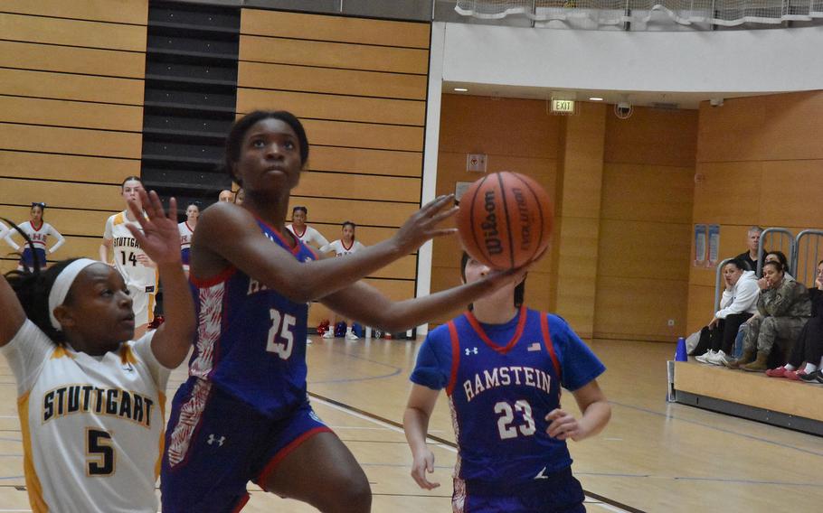 Ramstein's Bralyn Jones drives to the basket Thursday, Feb. 15, 2024, in a pool play game against Stuttgart at the DODEA European Division I Basketball Championships in Wiesbaden, Germany. Jones was hurt and had to leave the game, but the Royals prevailed.

Kent Harris/Stars and Stripes