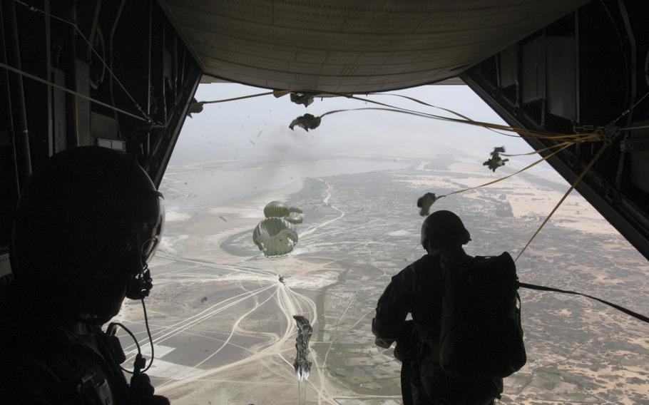 Members of the U.S. Army’s 10th Special Forces Group leap from a U.S. Air Force 352nd Special Operations Group C-130 Talon during a joint exercise between the American and Senegalese militaries. 