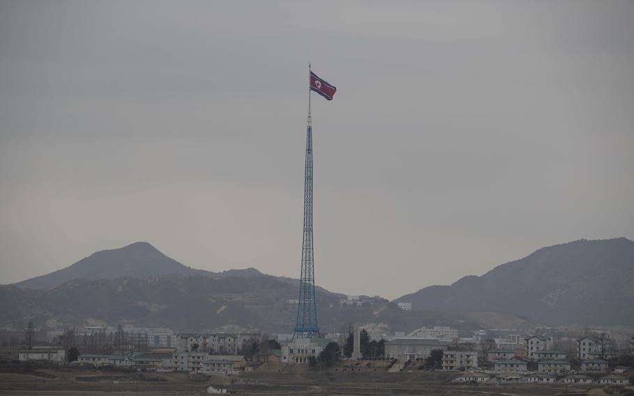 A North Korean flag flutters in North Korea's village Gijungdong as seen from an South Korea's observation post inside the demilitarized zone in Paju, South Korea during a media tour, March 3, 2023. The United States, its Western allies and experts shone a spotlight on the dire human rights situation and increasing repression in North Korea at a U.N. meeting Friday, March17, 2023 that China and Russia denounced as a politicized move likely to escalate tensions on the Korean peninsula.