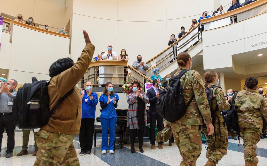 FEMA military medical personnel arrive to cheers at Saint Francis Hospital in Hartford Thursday.