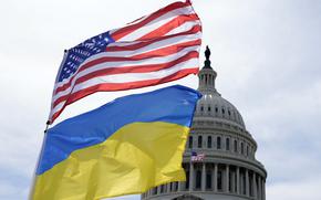 The American and Ukrainian flags wave in the wind outside of the Capitol on Tuesday, April 23, 2024, in Washington. The Senate is moving ahead with $95 billion in war aid to Ukraine, Israel and Taiwan.