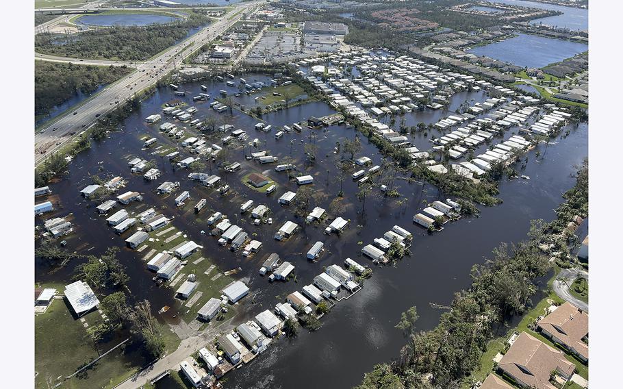 U.S. Coast Guard aircrews assess the damages from Hurricane Ian in the Sanibel, Florida area, on Sept. 29, 2022. Crews have been conducting search and rescue operations and assessing damage and potential pollution in the wake of the storm.