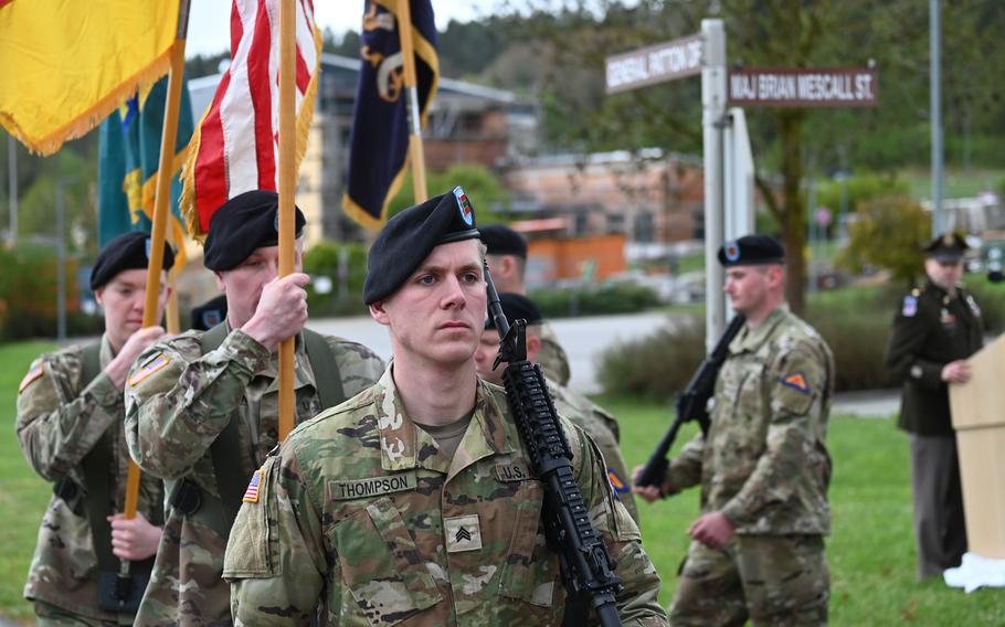An honor guard marches during a street renaming ceremony for Army Maj. Brian Mescall at Hohenfels Training Area, Germany, on Thursday, April 18, 2024. 