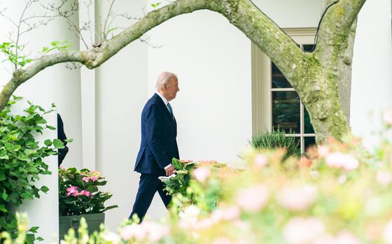 President Joe Biden makes his way to the Oval Office on Monday.