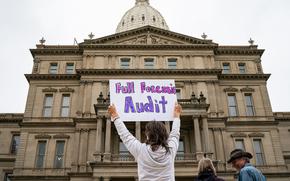 Supporters of former president Donald Trump gather for a rally at Michigan State Capitol in Lansing in October 2021 to demand a forensic audit of the 2020 election. 