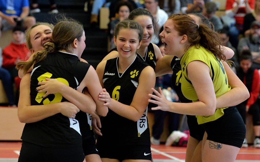 The Vicenza Cougars celebrate after defeating Naples  in the 2019 Division II finals at the DODEA-Europe volleyball championships in Kaiserslautern, Germany. After a 2020 season the was cancelled because of the coronavirus, teams throughout Europe will begin the 2021 competition this weekend.