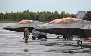 U.S. Air Force Staff Sgt. Isaiah Eyeland of the 90th Fighter Generation Squadron salutes an F-22 Raptor pilot June 3, 2025, in Alaska during Exercise Tropic Tundra, in preparation for Exercise Resolute Force Pacific.